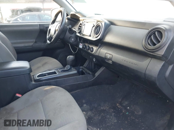 2016 Toyota Tacoma SR with VIN 5TFRX5GN1GX051753, listed as a IAAI auction lot 41313838 with 263,127 mi miles. Bid and sale history available at carsss.com. Image 5.