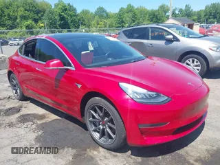 2019 Tesla Model 3 Mid Range z VIN 5YJ3E1EAXKF483331, wystawiony jako IAAI lot #42347375 z przebiegiem 48 622 mil mil oraz . Historia ofert i sprzedaży dostępna na DreamBid. Obrazek 1.