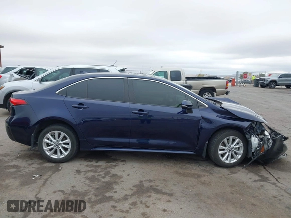 2023 Toyota Corolla Hybrid LE with VIN JTDBCMFE8PJ003081, listed as a IAAI auction lot 41041004 with 19,146 mi miles. Bid and sale history available at carsss.com. Image 13.