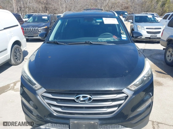 2017 Hyundai Tucson Value with VIN KM8J33A28HU302472, listed as a IAAI auction lot 41717598 with 126,438 mi miles. Bid and sale history available at carsss.com. Image 12.