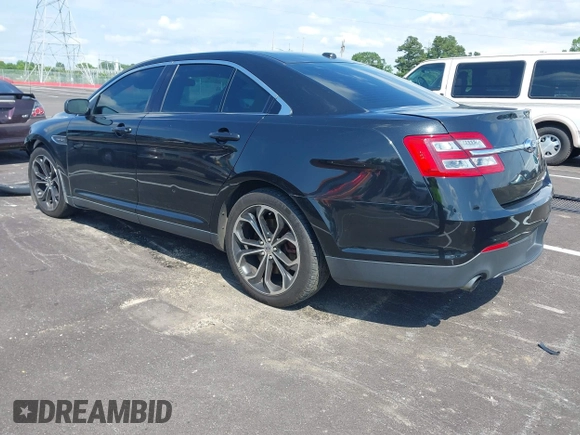 2013 Ford Taurus SHO z VIN 1FAHP2KT1DG135962, wystawiony jako IAAI lot #42449604 z przebiegiem 138 921 mil mil oraz . Historia ofert i sprzedaży dostępna na DreamBid. Obrazek 3.