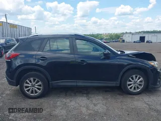 2016 Mazda CX-5 Sport with VIN JM3KE4BY2G0796577, listed as a IAAI auction lot 42230645 with 103,223 mi miles and . Bid and sale history available at DreamBid. Image 12.