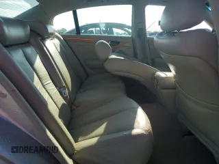 2003 Infiniti Q45 z VIN JNKBF01A93M103010, wystawiony jako Copart lot #74080224 z przebiegiem 46 898 mil mil oraz Szkody całkowita. Historia ofert i sprzedaży dostępna na DreamBid. Obrazek 10.