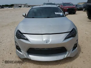 2013 Scion FR-S z VIN JF1ZNAA11D1704767, wystawiony jako Copart lot #52250275 z przebiegiem 82 246 mil mil oraz Czysty tytuł • Clean title. Historia ofert i sprzedaży dostępna na DreamBid. Obrazek 5.