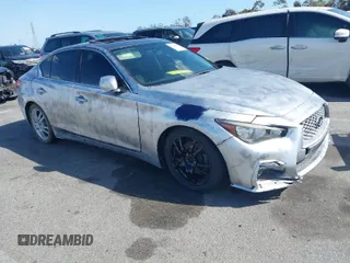 2015 Infiniti Q50 with VIN JN1BV7AP0FM332023, listed as a IAAI auction lot 41960006 with 173,540 mi miles. Bid and sale history available at carsss.com. Image 1.