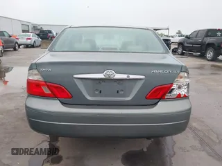 2004 Toyota Avalon XL with VIN 4T1BF28B94U387764, listed as a IAAI auction lot 42162419 with 306,611 mi miles and . Bid and sale history available at carsss.com. Image 16.