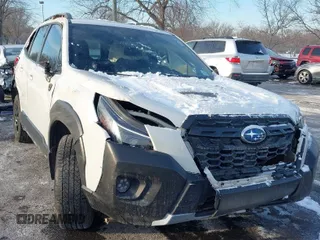 2022 Subaru Forester Wilderness with VIN JF2SKAMC4NH440391, listed as a IAAI auction lot 41404635 with 60,526 mi miles. Bid and sale history available at carsss.com. Image 1.