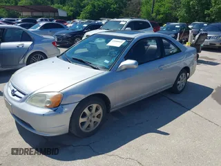 2003 Honda Civic EX with VIN 1HGEM22933L069450, listed as a IAAI auction lot 42088660 with 144,717 mi miles and . Bid and sale history available at DreamBid. Image 2.