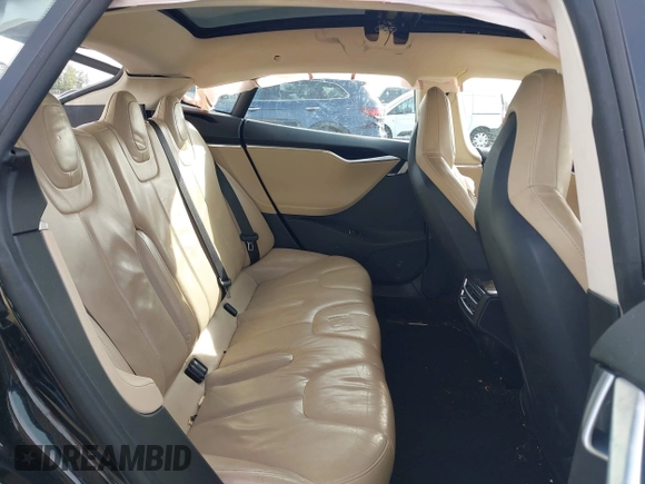 2014 Tesla Model S 60 with VIN 5YJSA1H12EFP53787, listed as a IAAI auction lot 42279493 with 168,859 mi miles and . Bid and sale history available at DreamBid. Image 8.