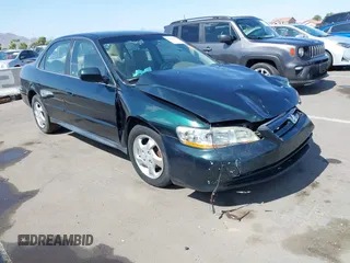 2001 Honda Accord LX with VIN JHMCG665X1C004411, listed as a IAAI auction lot 42653879 with 200,554 mi miles and . Bid and sale history available at DreamBid. Image 1.