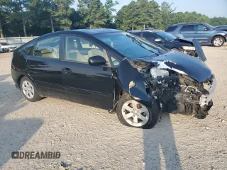 2007 Toyota Prius z VIN JTDKB20UX77600124, wystawiony jako Copart lot #61400525 z przebiegiem 102 957 mil mil oraz Czysty tytuł • Clean title. Historia ofert i sprzedaży dostępna na DreamBid. Obrazek 4.