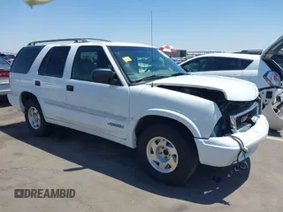2000 GMC Jimmy SLE z VIN 1GKCS13W1Y2390995, wystawiony jako IAAI lot #42272776 z przebiegiem 124 708 mil mil oraz . Historia ofert i sprzedaży dostępna na DreamBid. Obrazek 1.