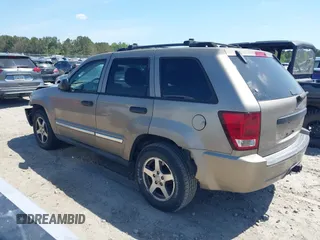 2005 Jeep Grand Cherokee Laredo with VIN 1J4HS48NX5C656582, listed as a IAAI auction lot 42079746 with Not Provided miles and . Bid and sale history available at DreamBid. Image 14.