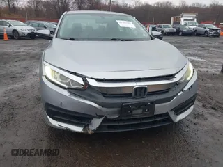 2016 Honda Civic EX with VIN 19XFC2F75GE217935, listed as a IAAI auction lot 41963307 with 87,477 mi miles and . Bid and sale history available at DreamBid. Image 6.