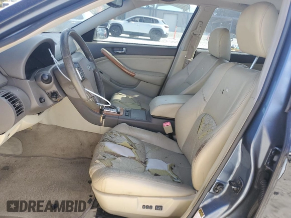 2005 Infiniti G35 with VIN JNKCV51E15M206903, listed as a Copart auction lot 76564124 with 261,392 mi miles and Salvage Title. Bid and sale history available at DreamBid. Image 7.