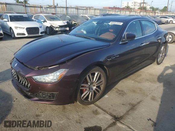 2018 Maserati Ghibli with VIN ZAM57XSA0J1286682, listed as a Copart auction lot 65457315 with 50,169 mi miles and Salvage title. Bid and sale history available at DreamBid. Image 1.