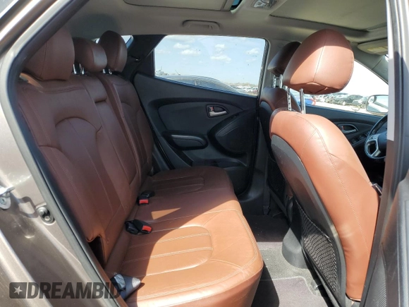 2010 Hyundai Tucson GLS with VIN KM8JU3AC8AU056499, listed as a Copart auction lot 53057365 with 119,906 mi miles and Salvage Title. Bid and sale history available at DreamBid. Image 10.