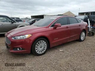 2014 Ford Fusion SE Hybrid with VIN 3FA6P0LUXER292421, listed as a Copart auction lot 63057465 with 146,020 mi miles and Salvage title. Bid and sale history available at DreamBid. Image 1.