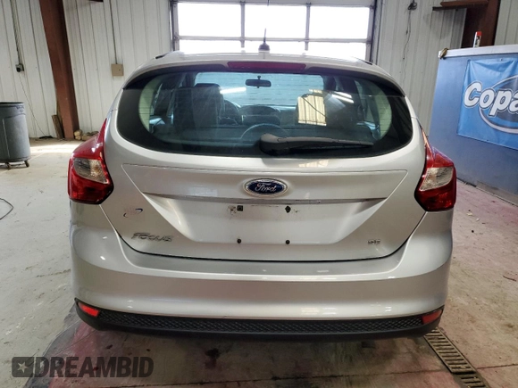2013 Ford Focus SE with VIN 1FADP3K22DL350527, listed as a Copart auction lot 51741945 with 53,283 mi miles and Salvage Title. Bid and sale history available at DreamBid. Image 6.