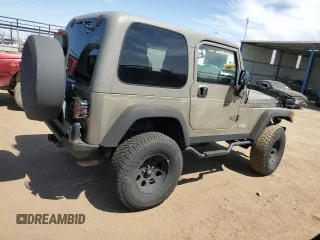 2004 Jeep Wrangler Rubicon with VIN 1J4FA69S64P751349, listed as a Copart auction lot 69642624 with 160,589 mi miles and Salvage Title. Bid and sale history available at carsss.com. Image 3.