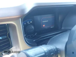 2023 Ford Bronco z VIN 1FMEE5DP0PLC16138, wystawiony jako IAAI lot #41310455 z przebiegiem 25 963 mil mil oraz . Historia ofert i sprzedaży dostępna na DreamBid. Obrazek 7.