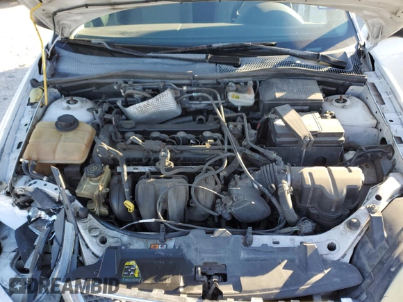 2007 Ford Focus S with VIN 1FAFP34N47W243028, listed as a Copart auction lot 55147695 with 218,672 mi miles and Salvage title. Bid and sale history available at DreamBid. Image 11.