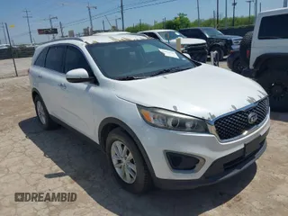 2016 Kia Sorento LX with VIN 5XYPG4A3XGG028712, listed as a IAAI auction lot 42013222 with 112,736 mi miles. Bid and sale history available at carsss.com. Image 1.