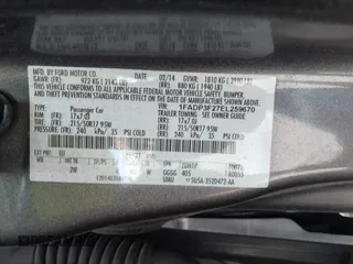 2014 Ford Focus SE with VIN 1FADP3F27EL259670, listed as a IAAI auction lot 42096236 with 132,951 mi miles and . Bid and sale history available at carsss.com. Image 9.