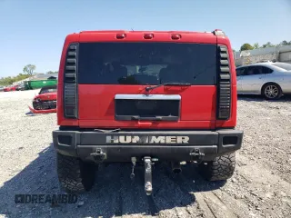 2004 Hummer H2 with VIN 5GRGN23U04H116668, listed as a Copart auction lot 41477165 with 0 mi miles and Salvage Title. Bid and sale history available at carsss.com. Image 6.