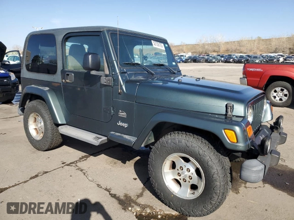 2003 Jeep Wrangler Sahara z VIN 1J4FA59SX3P302622, wystawiony jako Copart lot #52756105 z przebiegiem 181 900 mil mil oraz Szkoda całkowita • Salvage title. Historia ofert i sprzedaży dostępna na DreamBid. Obrazek 4.