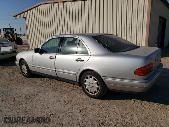 1998 Mercedes-Benz E-Class with VIN WDBJF65F1WA711193, listed as a Copart auction lot 76052034 with 168,935 mi miles and Salvage Title. Bid and sale history available at carsss.com. Image 2.