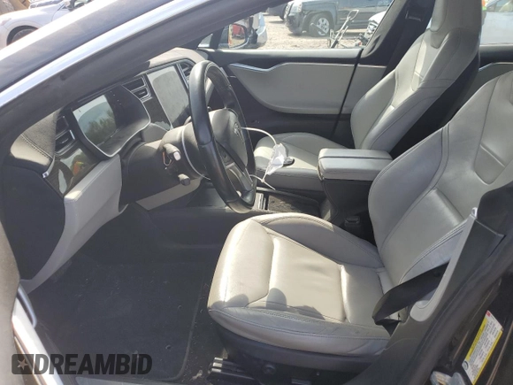 2016 Tesla Model S 90D with VIN 5YJSA1E28GF131212, listed as a Copart auction lot 54176705 with 97,373 mi miles and Salvage Title. Bid and sale history available at DreamBid. Image 7.