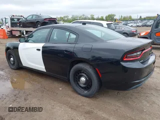 2018 Dodge Charger Police with VIN 2C3CDXKT4JH323762, listed as a IAAI auction lot 42184867 with 107,575 mi miles and . Bid and sale history available at carsss.com. Image 3.
