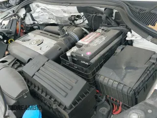 2017 Volkswagen Tiguan S with VIN WVGAV7AX4HK011010, listed as a IAAI auction lot 41082700 with 95,661 mi miles and . Bid and sale history available at DreamBid. Image 19.