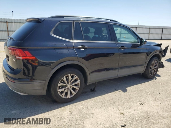 2018 Volkswagen Tiguan S with VIN 3VV1B7AXXJM069099, listed as a Copart auction lot 52345235 with 79,359 mi miles and Salvage title. Bid and sale history available at DreamBid. Image 3.