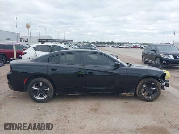 2023 Dodge Charger SXT z VIN 2C3CDXBG6PH656928, wystawiony jako IAAI lot #42027238 z przebiegiem 29 921 mil mil oraz . Historia ofert i sprzedaży dostępna na DreamBid. Obrazek 14.
