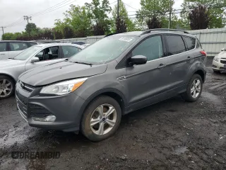 2014 Ford Escape SE z VIN 1FMCU9GXXEUB83184, wystawiony jako Copart lot #56188305 z przebiegiem 100 786 mil mil oraz Czysty tytuł • Clean title. Historia ofert i sprzedaży dostępna na DreamBid. Obrazek 1.