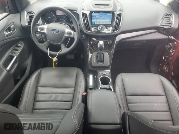 2016 Ford Escape Titanium with VIN 1FMCU9J90GUA02736, listed as a Copart auction lot 63068165 with 23,860 mi miles and Salvage title. Bid and sale history available at DreamBid. Image 8.
