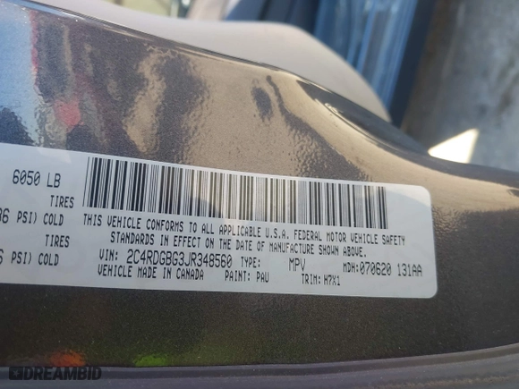 2018 Dodge Grand Caravan SE with VIN 2C4RDGBG3JR348560, listed as a IAAI auction lot 41657312 with 135,007 mi miles. Bid and sale history available at carsss.com. Image 9.