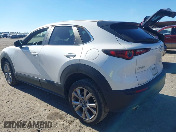 2021 Mazda CX-30 Select with VIN 3MVDMABL3MM239692, listed as a IAAI auction lot 41354738 with 48,928 mi miles and . Bid and sale history available at DreamBid. Image 3.