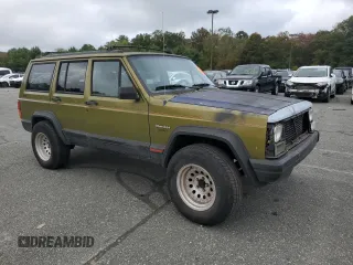 1996 Jeep Cherokee Sport with VIN 1J4FJ68S9TL291661, listed as a Copart auction lot 71968934 with 139,695 mi miles and Salvage Title. Bid and sale history available at carsss.com. Image 4.