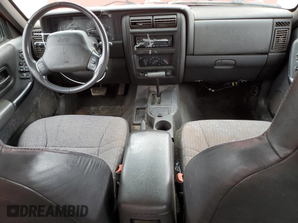 1999 Jeep Cherokee Sport with VIN 1J4FT68S2XL580915, listed as a Copart auction lot 50374875 with 286,276 mi miles and Salvage Title. Bid and sale history available at carsss.com. Image 8.