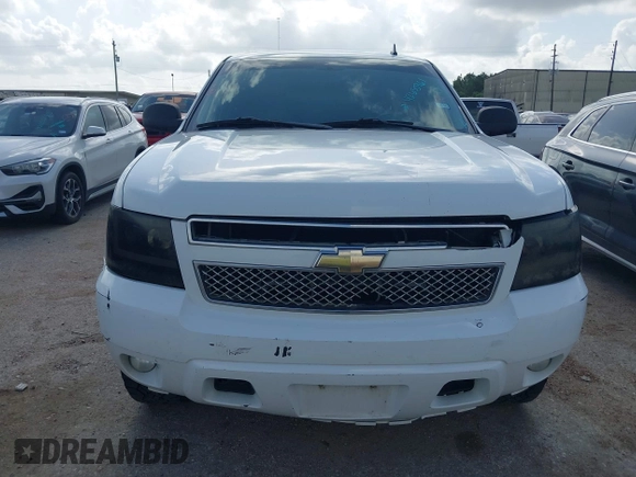 2011 Chevrolet Suburban LT with VIN 1GNSCJE09BR150452, listed as a IAAI auction lot 42655961 with 208,311 mi miles and . Bid and sale history available at DreamBid. Image 12.