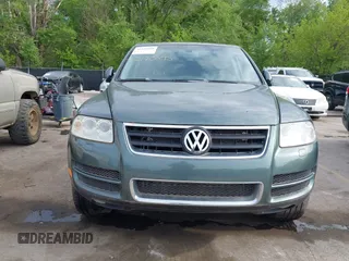 2004 Volkswagen Touareg with VIN WVGCM77L14D045663, listed as a IAAI auction lot 42170895 with 96,709 mi miles and . Bid and sale history available at DreamBid. Image 6.