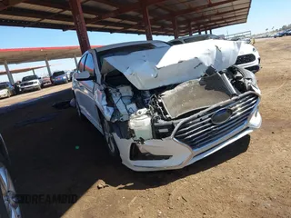 2018 Hyundai Sonata SE z VIN 5NPE24AF8JH706504, wystawiony jako IAAI lot #41844131 z przebiegiem 98 348 mil mil oraz . Historia ofert i sprzedaży dostępna na DreamBid. Obrazek 1.