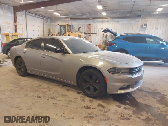2015 Dodge Charger SXT with VIN 2C3CDXHG0FH851638, listed as a IAAI auction lot 42144753 with 188,929 mi miles and . Bid and sale history available at DreamBid. Image 1.
