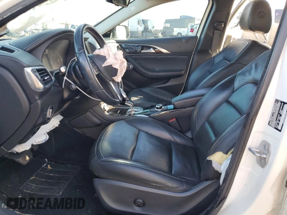 2017 Infiniti QX30 Premium with VIN SJKCH5CP8HA023394, listed as a Copart auction lot 43226665 with 96,392 mi miles and Salvage Title. Bid and sale history available at DreamBid. Image 7.