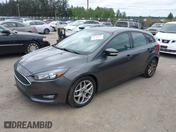 2015 Ford Focus SE with VIN 1FADP3K26FL269811, listed as a IAAI auction lot 42148333 with 157,192 mi miles. Bid and sale history available at carsss.com. Image 2.