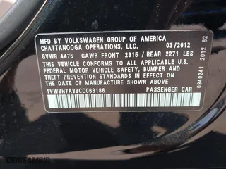2012 Volkswagen Passat SE w/Sunroof with VIN 1VWBH7A38CC063186, listed as a IAAI auction lot 41700992 with 151,454 mi miles. Bid and sale history available at carsss.com. Image 9.