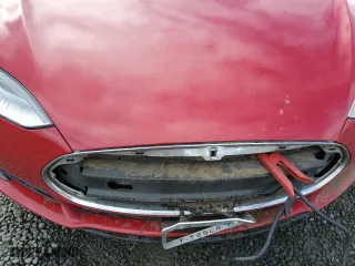 2013 Tesla Model S with VIN 5YJSA1CN9DFP19743, listed as a Copart auction lot 49555255 with 0 mi miles and Salvage Title. Bid and sale history available at carsss.com. Image 12.